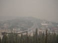 Heavy smoke from nearby wildfires fills the sky in Yellowknife on Tuesday, August 15, 2023.