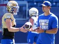 Bombers quarterbacks Dru Brown (left) and Zach Collaros