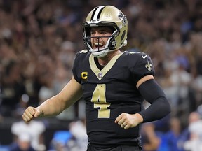 Derek Carr of the New Orleans Saints celebrates during the fourth quarter against the Tennessee Titans.