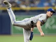 Blue Jays' Chris Bassitt follows through on a pitch to the Tampa Bay Rays during the first inning on Friday, Sept. 22, 2023, in St. Petersburg, Fla.