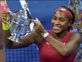 USA's Coco Gauff poses with the trophy after winning the U.S. Open tennis tournament women's singles final match against Belarus's Aryna Sabalenka at the USTA Billie Jean King National Tennis Center in New York City, on Sept. 9, 2023.