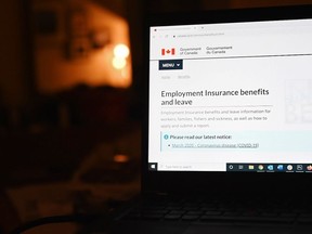 The Canada Revenue Agency says 120 people have been fired for claiming a federal COVID-19 benefit while employed at the tax department. The employment insurance section of the Government of Canada website is shown on a laptop in Toronto on April 4, 2020.