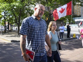 Chris Barber arrives for his trial at the courthouse in Ottawa, on Monday, Sept. 11, 2023. The court is expected to watch several lengthy press conferences hosted by the "Freedom Convoy" as the criminal trial for two of the protest's organizers enters its seventh day.THE CANADIAN PRESS/Justin Tang