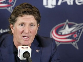 Mike Babcock addresses the media as the Columbus Blue Jackets introduce Babcock as their new head coach during a news conference on Saturday, July 1, 2023 in Columbus, Ohio. The NHL Players' Association says its executive director and assistant executive director are in Columbus, Ohio, to investigate reports of Babcock invading players' privacy.THE CANADIAN PRESS/Kyle Robertson-The Columbus Dispatch via AP
