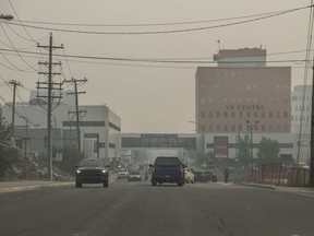 Heavy smoke from nearby wildfires fills the sky in Yellowknife on Tuesday, Aug. 15, 2023.