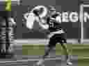 Saskatchewan Roughriders quarterback Jake Dolegala (9) throws the ball during practice at Mosaic Stadium on Wednesday, Aug. 30, 2023 in Regina. 