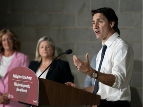 Prime Minister Justin Trudeau speaks during a visit to an apartment complex under construction in Hamilton, Ont., Monday, July 31, 2023.