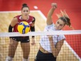 Canada's Kiera Van Ryk spikes the ball in her team's bronze medal victory over Cuba in the the 2023 NORCECA Senior Women's Volleyball Continental Championship in Quebec City in a Sunday, Sept. 3, 2023, handout photo.