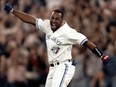 Joe Carter celebrates after the Blue Jays won the World Series in 1993.