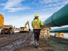 A Trans Mountain Pipeline worker is pictured in this file photo.