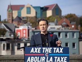 Conservative Leader Pierre Poilievre is calling on the Liberals to exempt all forms of home heating from the carbon price, after Prime Minister Justin Trudeau announced an exemption on home heating oil. Poilievre holds a press conference regarding his ?Axe the Tax? message from the roof a parking garage in St. John's, Friday, Oct.27, 2023.