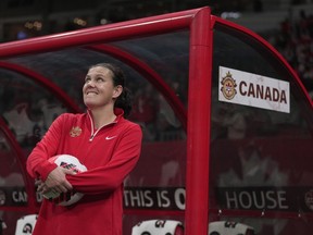 Canada's Christine Sinclair watches a video tribute as she is recognized for her international goal scoring record set in 2020, before a women's friendly soccer match against Nigeria, in Vancouver, on Friday, April 8, 2022. The star Canadian soccer player has announced her retirement.