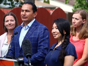 NDP Leader Wab Kinew with candidates