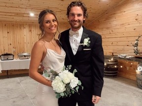 Late former NHLer Adam Johnson with girlfriend Ryan Wolfe.