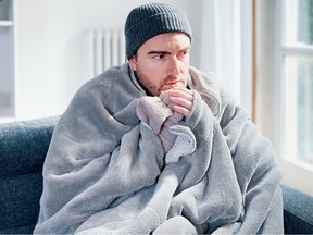Man suffering cold at home