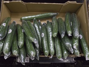 Cucumbers are shown packaged in plastic.