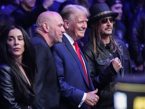 UFC president Dana White, second from left, and Kid Rock, right, pose for photographs with former President Donald Trump at UFC 295 on Saturday, Nov. 11, 2023, in New York.