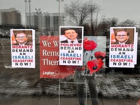 Posters put on MP Marty Morantz’s office window