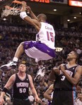 VINCE CARTER SCORES PAST SHAREEF ADBUR-RAHIM AND BRYANT REEVES BACK IN THE DAY.