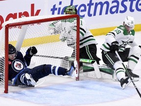 Jets forward Vlad Namestnikov crashes into the Dallas net on Saturday. CP
