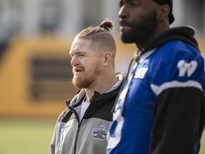 Injured Winnipeg Blue Bombers linebacker Adam Bighill watches on the sidelines during practice in Hamilton, Ont., Thursday, Nov. 16, 2023. Winnipeg Blue Bombers will play the Montreal Alouettes in the 110th Grey Cup on Sunday. Bighill is listed as a game-time decision.