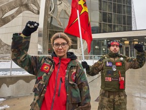 Dana Kopnitsky, left, godmother of victim Linda Beardy's youngest son and First Nations Indigenous Warrior and supporter for the families who have lost loved ones Michael Allen stand outside of the Manitoba Law Courts, as alleged serial killer Jeremy Skibicki attends pretrial proceedings in Winnipeg, Monday, Nov. 6, 2023.