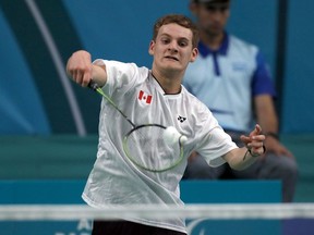 William Roussy of Canada returns to Pedro De Vinatea of Peru in the SL3 men's singles badminton event at Parapan American Games in Santiago, Chile on Sunday, Nov.23, 2023. Roussy of Marie, Que., earned a silver medal in the event on the final day of the Parapan American Games.