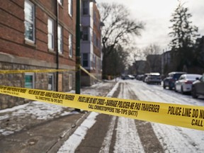 Police secure a crime scene where multiple people were killed in the 100 block of Langside Street in Winnipeg on Sunday, Nov. 26, 2023. A Metro Vancouver MP says he stands by his social media post that questioned if there was a connection between Conservative Leader Pierre Poilievre and a weekend shooting in Manitoba that killed four people.THE CANADIAN PRESS/David Lipnowski