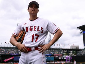 Shohei Ohtani of the Los Angeles Angels looks on during Gatorade All-Star Workout Day at T-Mobile Park.