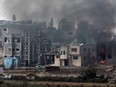 A picture taken from southern Israel bordering the Gaza Strip on December 27, 2023, shows smoke billowing following Israeli bombardment in the Palestinian territory amid ongoing battles with the Hamas militant group.