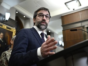 Minister of Environment and Climate Change Steven Guilbeault speaks during a media availability on Parliament Hill in Ottawa, on Monday, Nov. 27, 2023.
