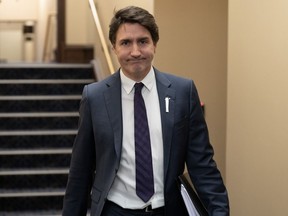 Prime Minister Justin Trudeau makes his way to Question Period on Wednesday, December 6.