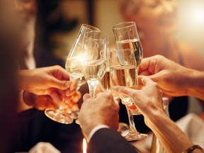 Success, hands or toast in a party for goals, winning deal or new year at luxury social event celebration. Motivation, team work or people cheers with champagne drinks or wine glasses at dinner gala