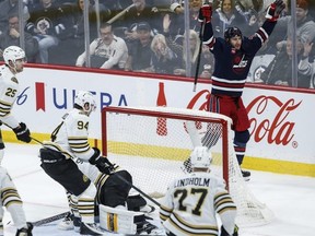 Winnipeg Jets’ Gabriel Vilardi celebrates his goal on Bruins goaltender Jeremy Swayman.   John Woods/THE CANADIAN PRESS