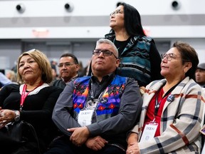 David Pratt, centre, is seen with supporters following the fifth round of voting at the Assembly of First Nations special chiefs assembly in Ottawa, on Wednesday, Dec. 6, 2023.