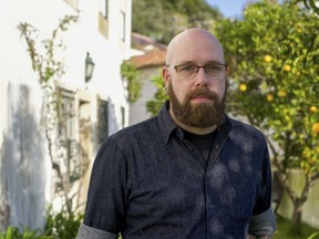 David Thiel, chief technologist at the Stanford Internet Observatory and author of its report that discovered images of child sexual abuse in the data used to train artificial intelligence image generators, poses for a photo on Wednesday, Dec. 20, 2023, in Obidos, Portugal. Pictures of Canadian victims are among the thousands of images.