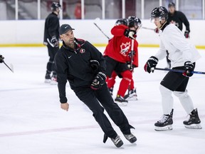 Canada's under-20 men's national team will be without a handful of NHLers when it opens the world junior hockey championship against Finland on Tuesday. Canada head coach Alan Letang is seen at practice in Malmo, Sweden, Monday, Dec. 18, 2023.
