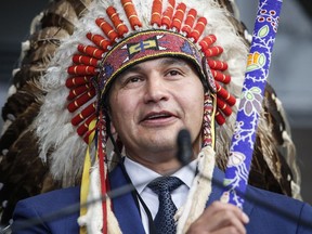 Manitoba Premier Wab Kinew performs a pipe ceremony at a premier and cabinet swearing-in ceremony in Winnipeg on Wednesday, Oct. 18, 2023. The Manitoba government indicated it is now open to allowing a First Nations casino in the province's capital -- something Indigenous leaders have long fought for.
