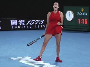 Aryna Sabalenka of Belarus reacts during her match against Zheng Qinwen of China in the women's singles final at the Australian Open tennis championships at Melbourne Park, Melbourne, Australia, Saturday, Jan. 27, 2024.