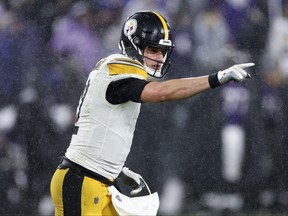 Mason Rudolph of the Pittsburgh Steelers celebrates after throwing a touchdown in the fourth quarter of a game against the Baltimore Ravens at M&T Bank Stadium on Jan. 6, 2024 in Baltimore, Md.