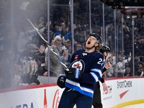Winnipeg Jets' Mason Appleton celebrates his goal against the New York Islanders Tuesday night. Fred Greenslade/The Canadian Press