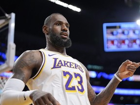 Los Angeles Lakers forward LeBron James gestures after scoring during the first half of an NBA basketball game against the Portland Trail Blazers Sunday, Jan. 21, 2024, in Los Angeles.