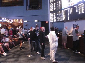 Gamblers line up to make sports bets at the Ocean Casino Resort in Atlantic City, N.J.
