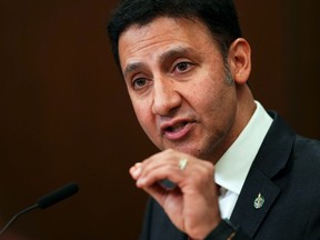 Justice Minister Arif Virani speaks during a news conference on Parliament Hill in Ottawa regarding the new online harms bill on Monday, Feb. 26, 2024.