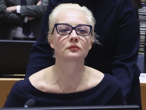 Yulia Navalnaya, wife of Russian opposition leader Alexei Navalny, addresses a meeting of EU foreign ministers at the European Council building in Brussels, Monday, Feb. 19, 2024. (Yves Herman, Pool Photo via AP)
