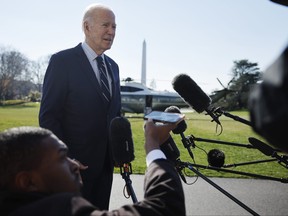 U.S. President Joe Biden talks briefly with reporters after returning to the White House on Feb. 19, 2024 in Washington, D.C.