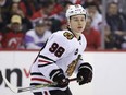 FILE - Chicago Blackhawks center Connor Bedard skates during the team's NHL hockey game against the New Jersey Devils on Jan. 5, 2024, in Newark, N.J. Bedard was expected to return to the ice Thursday night, Feb. 15, after missing nearly six weeks with a broken jaw, coach Luke Richardson said before the team's game against Pittsburgh.