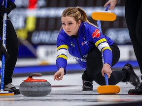 Alberta skip Selena Sturmay makes a shot against Prince Edward Island during the Scotties Tournament of Hearts at the WinSport Event Centre in Calgary on Saturday, Feb. 17, 2024.