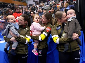 Team Manitoba's (left to right) Selena Njegovan, Kaitlyn Lawes and Jocelyn Peterman and their new additions after beating Team NEWFOUNDLAND & LABRADOR during the morning draw at the Scotties Tournament of Hearts in Calgary on Monday, February 19, 2024.