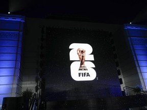 FIFA lifts the cover, at least partially, on the 2026 FIFA World Cup schedule via a televised reveal from CONCACAF headquarters in Miami. The logo for the 2026 World Cup is shown on a screen outside Griffith Observatory in Los Angeles on Wednesday, May 17, 2023.